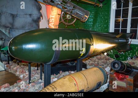 British Red Beard atomic bomb nuclear weapon (green and large) at the Explosion Museum of Naval Firepower; the Royal Navy's former armaments depot of Priddy's Hard, in in Gosport, near Portsmouth. UK (105) Stock Photo