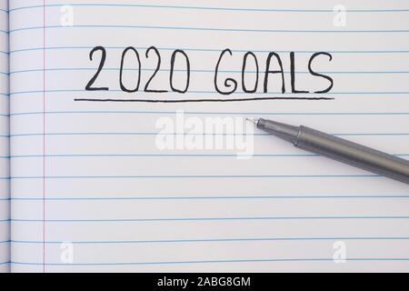 2020 goals list on notebook sheet. Close up. Stock Photo