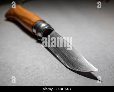 Knife with wooden handle on white background Stock Photo