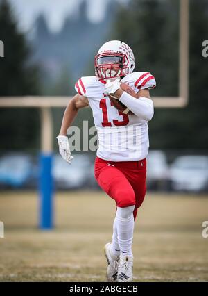 Football action with Weiser vs Timberlake in Spirit Lake, Idaho. Stock Photo