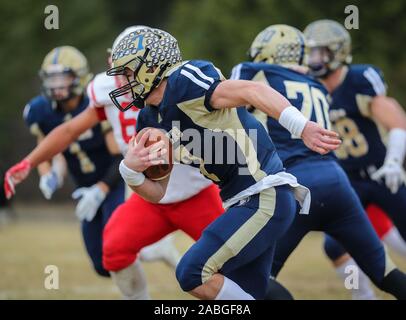 Football action with Weiser vs Timberlake in Spirit Lake, Idaho. Stock Photo