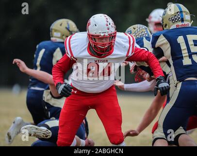 Football action with Weiser vs Timberlake in Spirit Lake, Idaho. Stock Photo