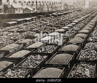 c1945 South Wales railway sidings with open wagons  filled with various grades of coal ready for delivery or export by train. Stock Photo