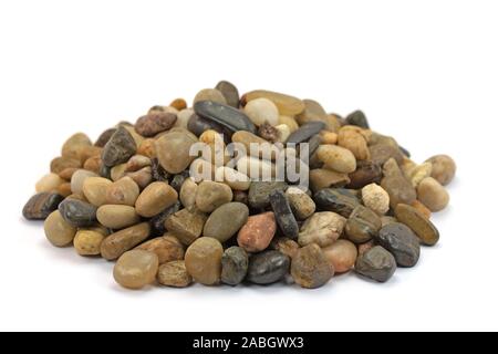 Many colorful pebbles in front of white background Stock Photo