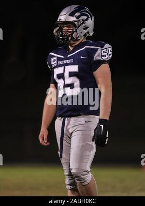 Football action with Couer d'Aene vs Lake City High School in Couer d'Alene, Idaho. Stock Photo