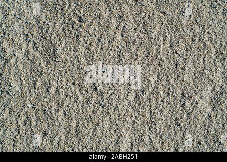 Close-up of fine sea sand grains on beach Stock Photo