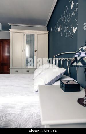 Elegant furnished double bedroom interior Stock Photo