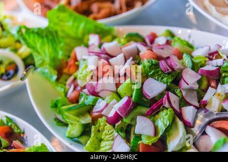 Assortment of fresh vegetable salads in restaurant buffet. Stock Photo