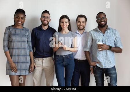Studio portrait young successful diverse business people team. Stock Photo