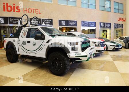 DUBAI, UAE - NOVEMBER 16: The Ford Raptor of Dubai Police, Chevrolet Tahoe rescue cars, BMW i8 electric car are on Dubai Motor Show 2019 on November 1 Stock Photo