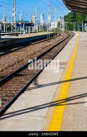 Railway platform, tracks and electric traction in Warsaw East Railway Station, Warsaw Poland Stock Photo