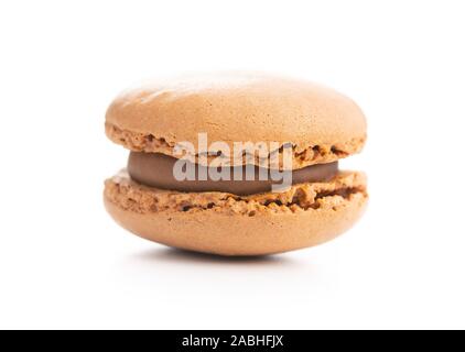 Sweet chocolate macaron isolated on white background. Stock Photo