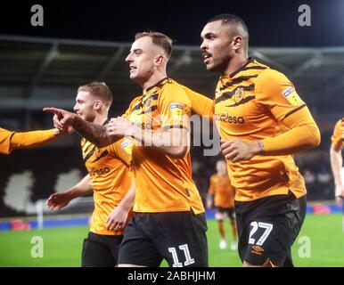 Hull City's Kamil Grosicki (centre) celebrates scoring his sides 3rd goal with team mates Daniel Batty (left) and Josh Magennis (right) during the Sky Bet Championship match at the KCOM Stadium, Hull. Stock Photo