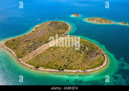 Croatia, beautiful coastline on Adriatic sea, romantic heart shaped island of Galesnjak, aerial drone view Stock Photo