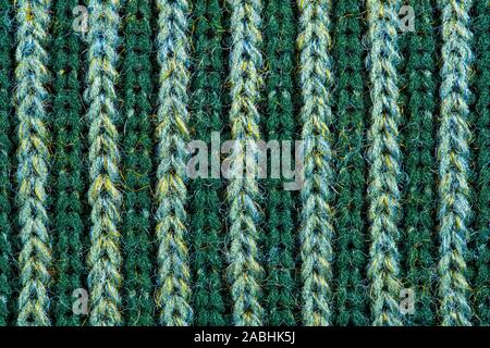 Green knitting wool texture. Cloth background close up Stock Photo