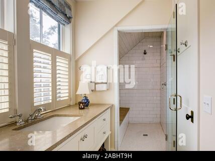 Bathroom interior with beautiful tile wheelchair accessible shower. Stock Photo