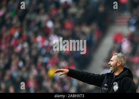 Stuttgart, Germany. 24th Nov, 2019. Soccer: 2nd Bundesliga, VfB Stuttgart - Karlsruher SC, 14th matchday, Mercedes-Benz Arena. Coach Tim Walter from VfB Stuttgart gesticulates Credit: Tom Weller/dpa - IMPORTANT NOTE: In accordance with the requirements of the DFL Deutsche Fußball Liga or the DFB Deutscher Fußball-Bund, it is prohibited to use or have used photographs taken in the stadium and/or the match in the form of sequence images and/or video-like photo sequences./dpa/Alamy Live News Stock Photo