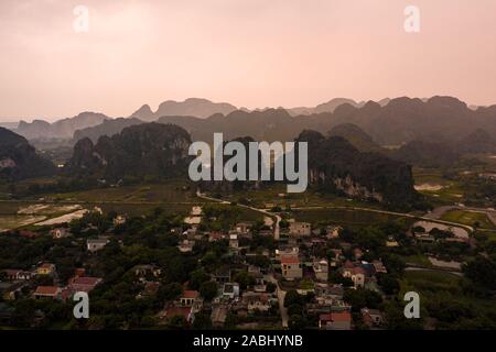 Aerial view of Tam Coc near Ninh Binh at sunset in Northern Vietnam, Asia. Stock Photo