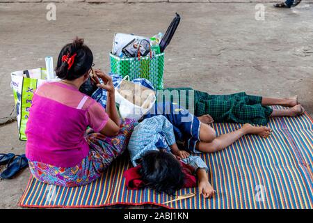 Local People Sleeping On The Platform Of Yangon Railway Station, Yangon, Myanmar. Stock Photo