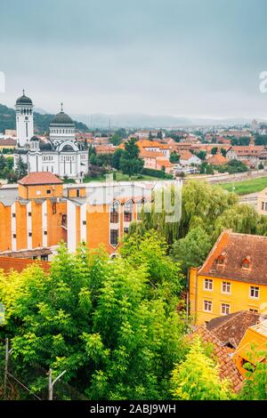 The Holy Trinity Orthodox Cathedral and Sighisoara old town panorama view in Romania Stock Photo