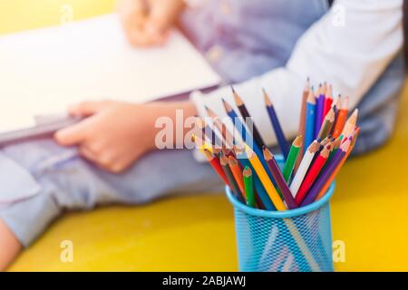 Colors pencils with Kids Drawing Arts, Creative Education and learning in School concept. Stock Photo