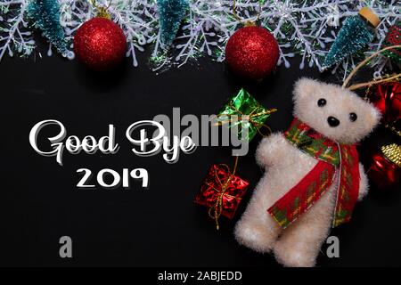 Good Bye 2019 text isolated on black backgroud. Frame of Christmas Decoration. Stock Photo