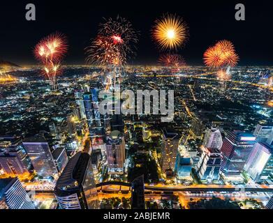 beautiful Fireworks celebrating over Bangkok cityscape at night, Thailand Stock Photo