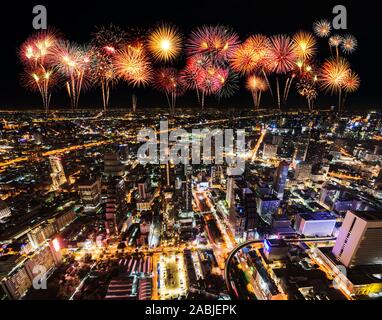 beautiful Fireworks celebrating over Bangkok cityscape at night, Thailand Stock Photo