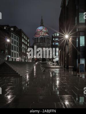 Walkway to a  view of 'Ancient of Days' by William Blake projected on to dome of St Paul's Cathedral in background Stock Photo