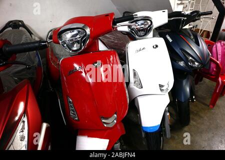 Antipolo City, Philippines – November 26, 2019: Assorted motorcycles and scooters on display at a motorcycle store. Stock Photo