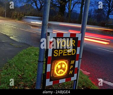 Community speed radar checks,showing Your Speed in MPH, A50, Knutsford Road, Grappenhall / Massey Brook, Warrington, Cheshire, England UK - Sad Face Stock Photo