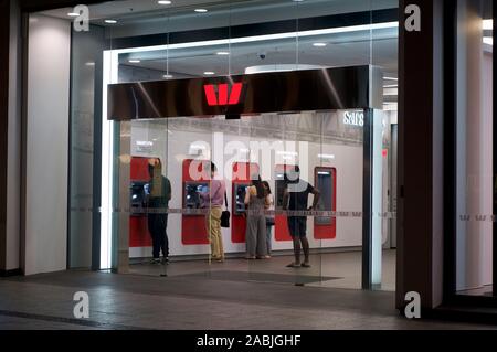 Brisbane, Queensland, Australia - 26th November 2019 : View of the Westpac bank entrance hall in Queenstreet with many many people using their ATM's Stock Photo