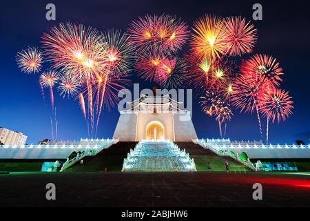 Fireworks celebrating over Chiang Kai-Shek Memorial Hall at night in Taipei, Taiwan Stock Photo