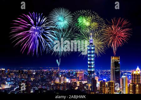 Fireworks celebrating over Taipei cityscape at night, Taiwan Stock Photo