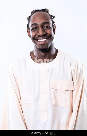 portrait of  handsome african black man in traditional islamic sudan fashion clothes isolated on white background Stock Photo