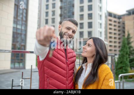 Joyful married couple moving into a new house Stock Photo