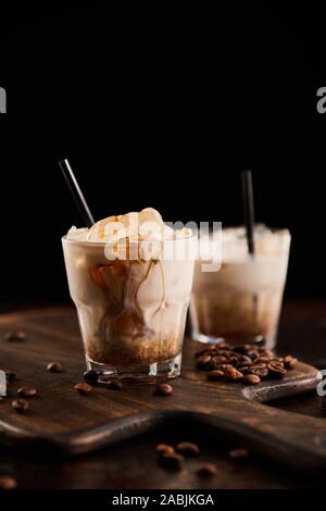 Black Coffee Beans Studio Shot. Freshly Roasted Coffee Beans As Texture 