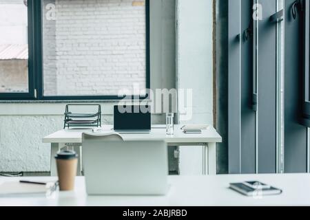 Modern Office Space With Desks And Laptops Stock Photo 164788711