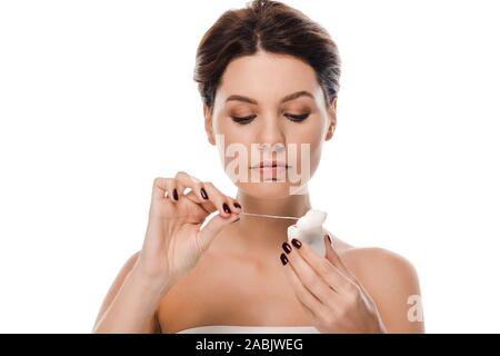 attractive woman holding dental floss isolated on white Stock Photo