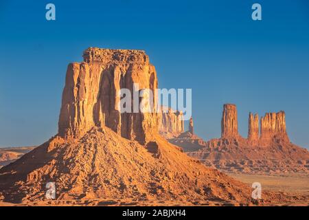 Monument Valley region of the Colorado Plateau with vast sandstone buttes on the Arizona–Utah border, in a Navajo Nation Reservation. USA Stock Photo