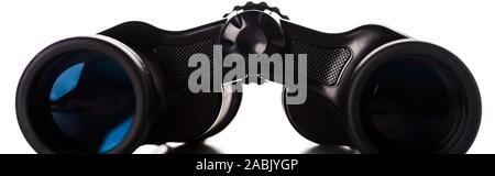 panoramic shot of black binoculars with lens isolated on white Stock Photo