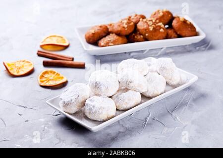 Traditional homemade greek melomakarona and kourabiedes for Christmas Stock Photo