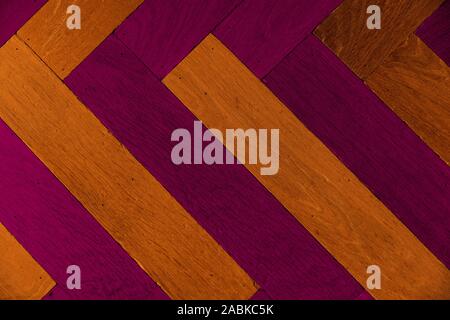 Colorful wood grain textured planks with apink and a orange effect background Stock Photo