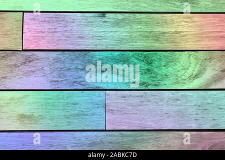 Wood grain texture planks panels with a rainbow effect background. Beautiful pattern, bright vibrant colors. Rustic hardwood, background wallpaper Stock Photo