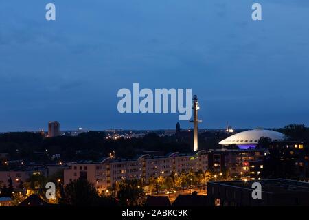 Eindhoven, The Netherlands, June 17th 2019. A view of Eindhoven city with the famous futuristic building Evoluon building during sunset with a dark bl Stock Photo