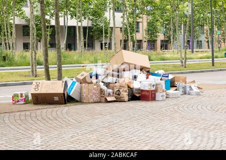 Eindhoven, The Netherlands, June 14th 2019. A view of Eindhoven Strijp S and a closeup of old gabage from people, carton boxes and paper collected for Stock Photo