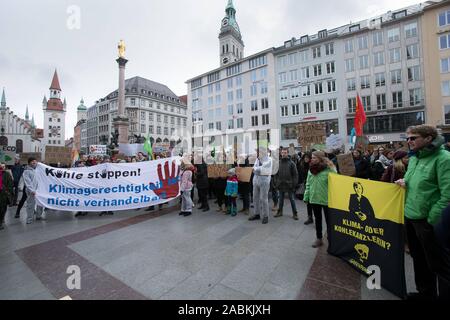 About 300 people demonstrate on the Marienplatz in front of the Munich town hall for a faster exit from brown coal. [automated translation] Stock Photo