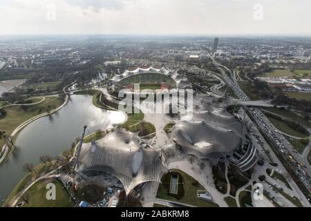 Panoramic view from the Munich Olympic Tower onto the Olympic Park with the Olympic Swimming Hall (l), the Olympic Hall (r.), the Olympic Lake and the Olympic Stadium. On the right in the background the O2 skyscraper. [automated translation] Stock Photo