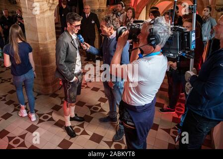 The team of FC Bayern Munich on the way to the championship and cup winner celebration in the Munich city hall. In the picture Robert Lewandowski. [automated translation] Stock Photo