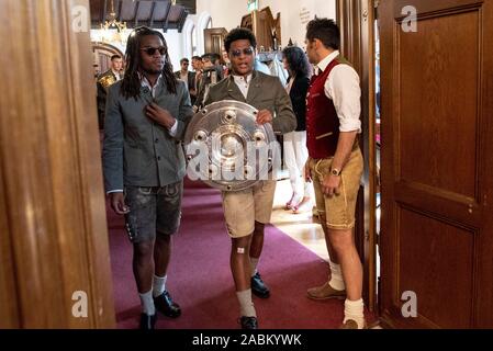 The team of FC Bayern Munich on the way to the championship and cup winner celebration in the Munich city hall. In the picture (from left to right) Renato Sanches, Serge Gnabry and sports director Hasan Salihamidzic. [automated translation] Stock Photo